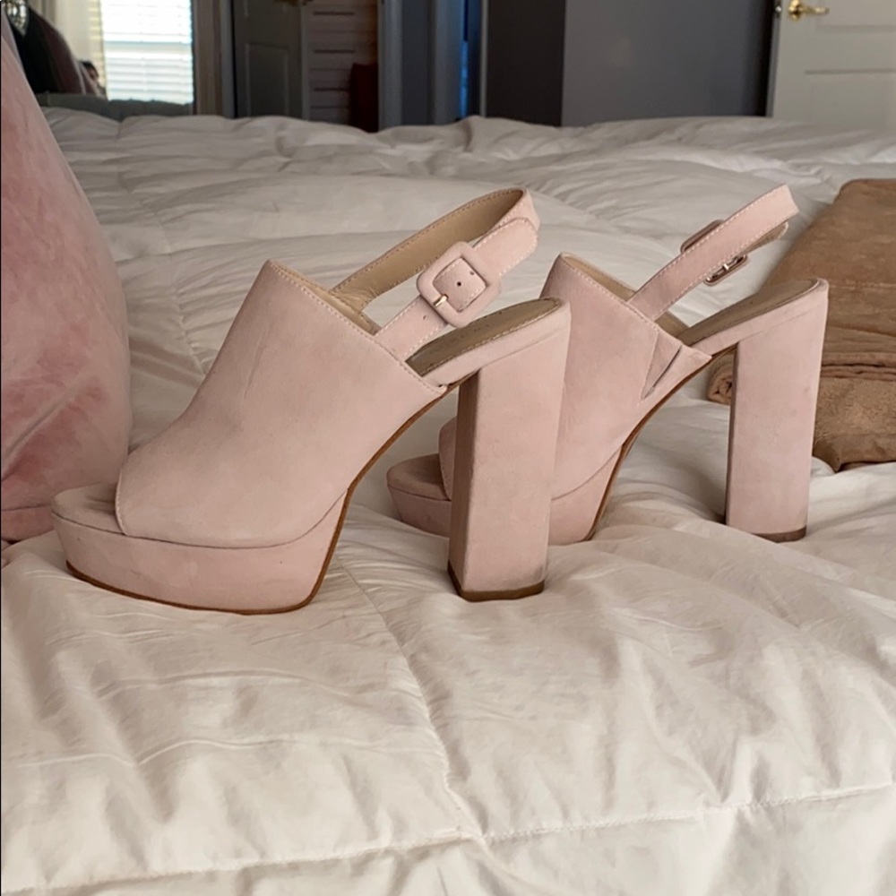 Suede platform sling back sandal.